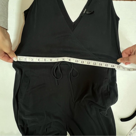 Forever 21 Black Jersey Jumsuit Low V Size S.
Lightweight, soft & comfortable - Picture 10 of 10